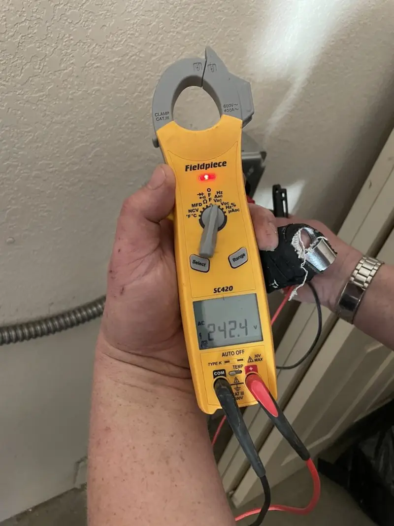Voltage testing with clamp meter during Electrical Installation Services in Marina del Rey
